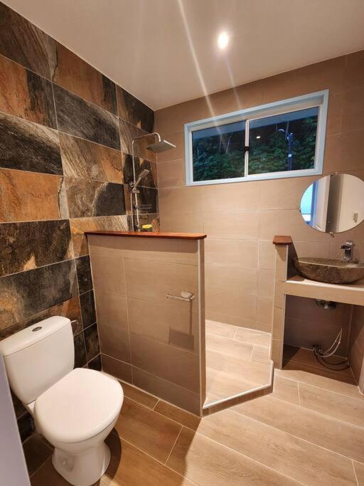 Duplex En Bord De Mer Fare Tahitea Pension Taputapuapea ภายนอก รูปภาพ